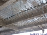 Installing duct work hangers at the 3rd floor Facing North.jpg